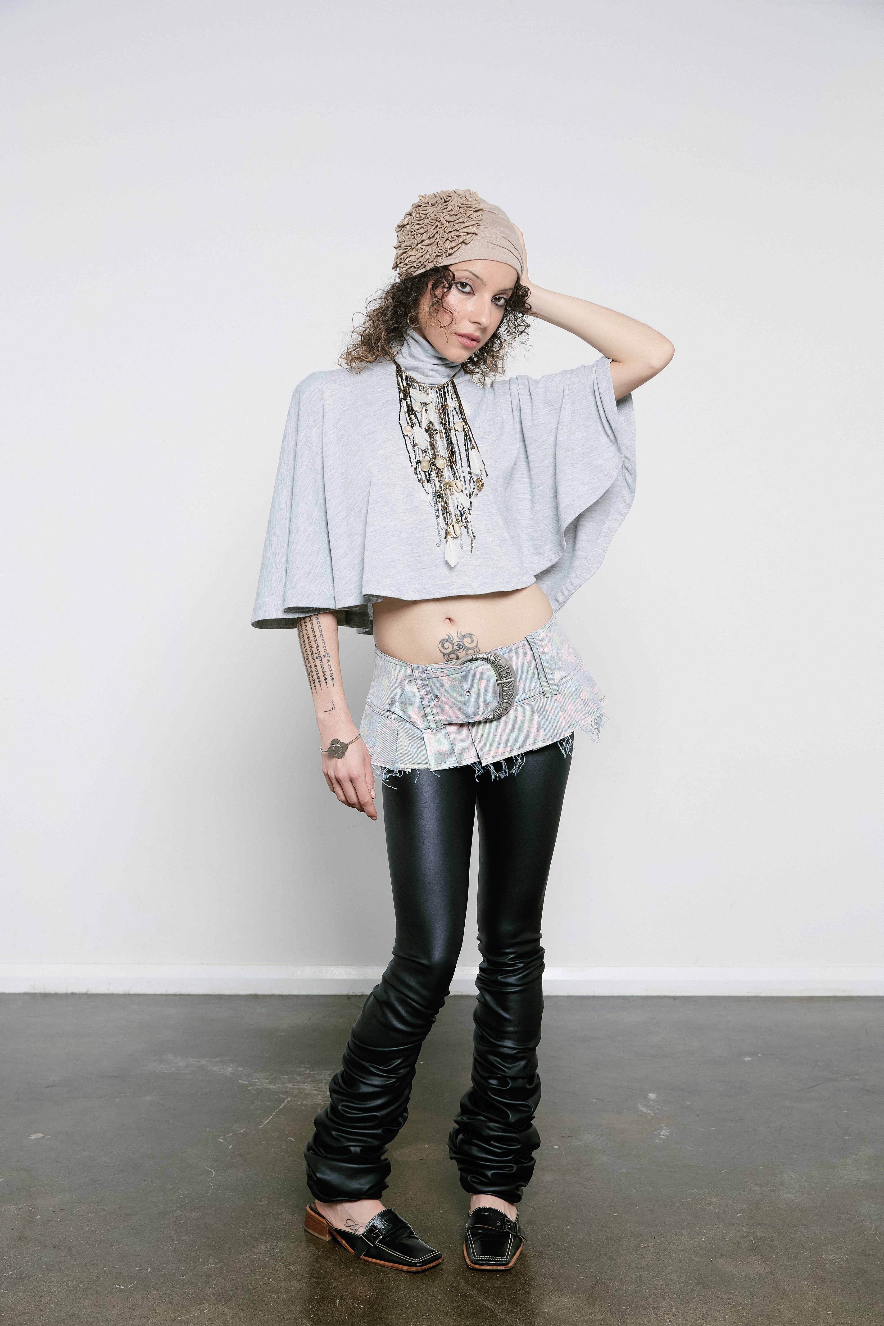 Pleated belt that is slashed at the hem, a signature centre front Maroske Peech branded D buckle holds the belt closed with three adjustable eyelet sizes settings. The Faded Floral Demi belt is an exclusive limited edition style, only 17 pieces exist in this colourway.
