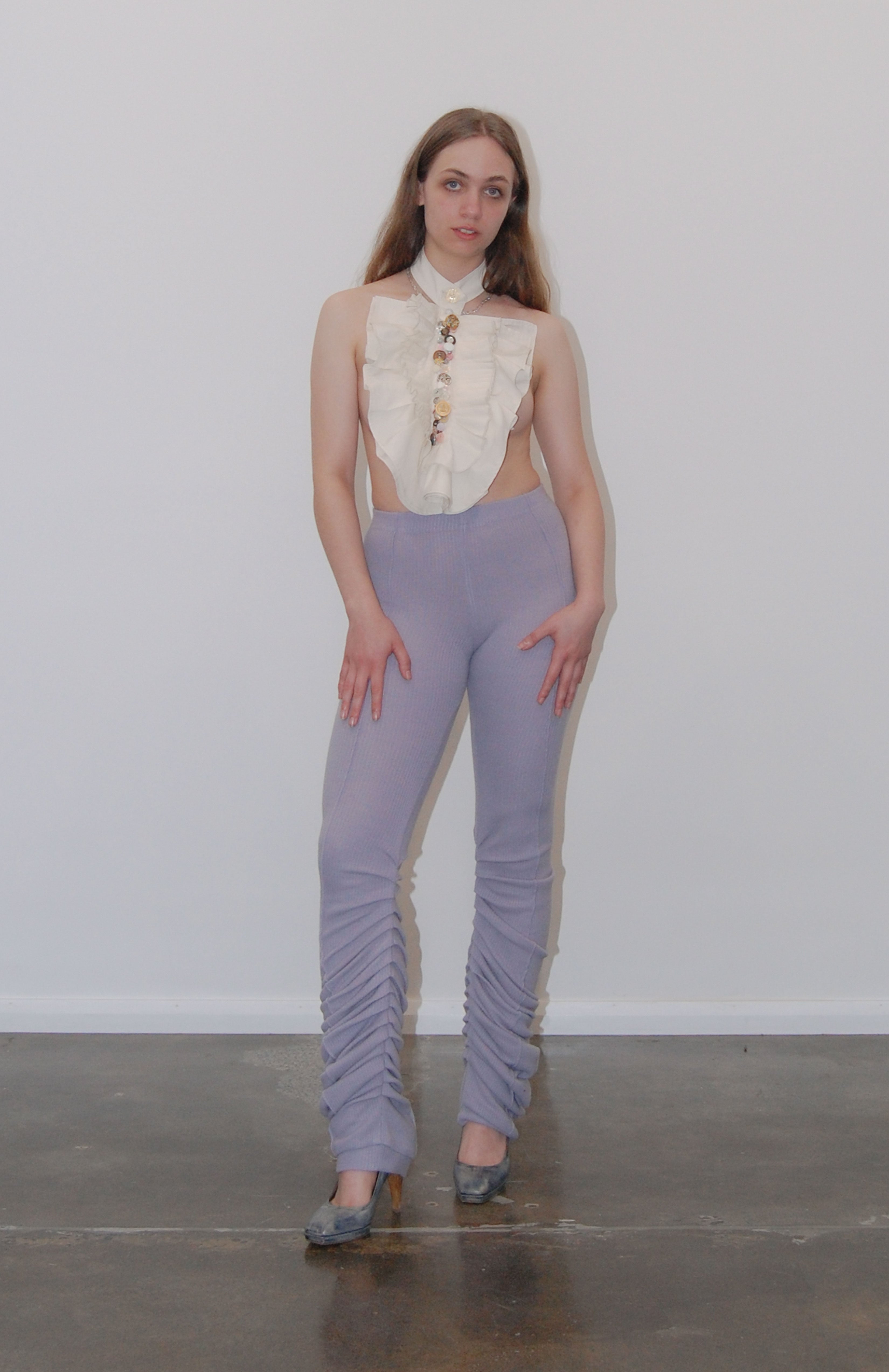 Maroske Peech High-rise wool-blend warm-up lilac leggings. Pleated inseam starts from the knee for a lamb leg effect. Flattering pin tucks run along the back and front of both legs giving you visual cues to correct your lines in the mirror.