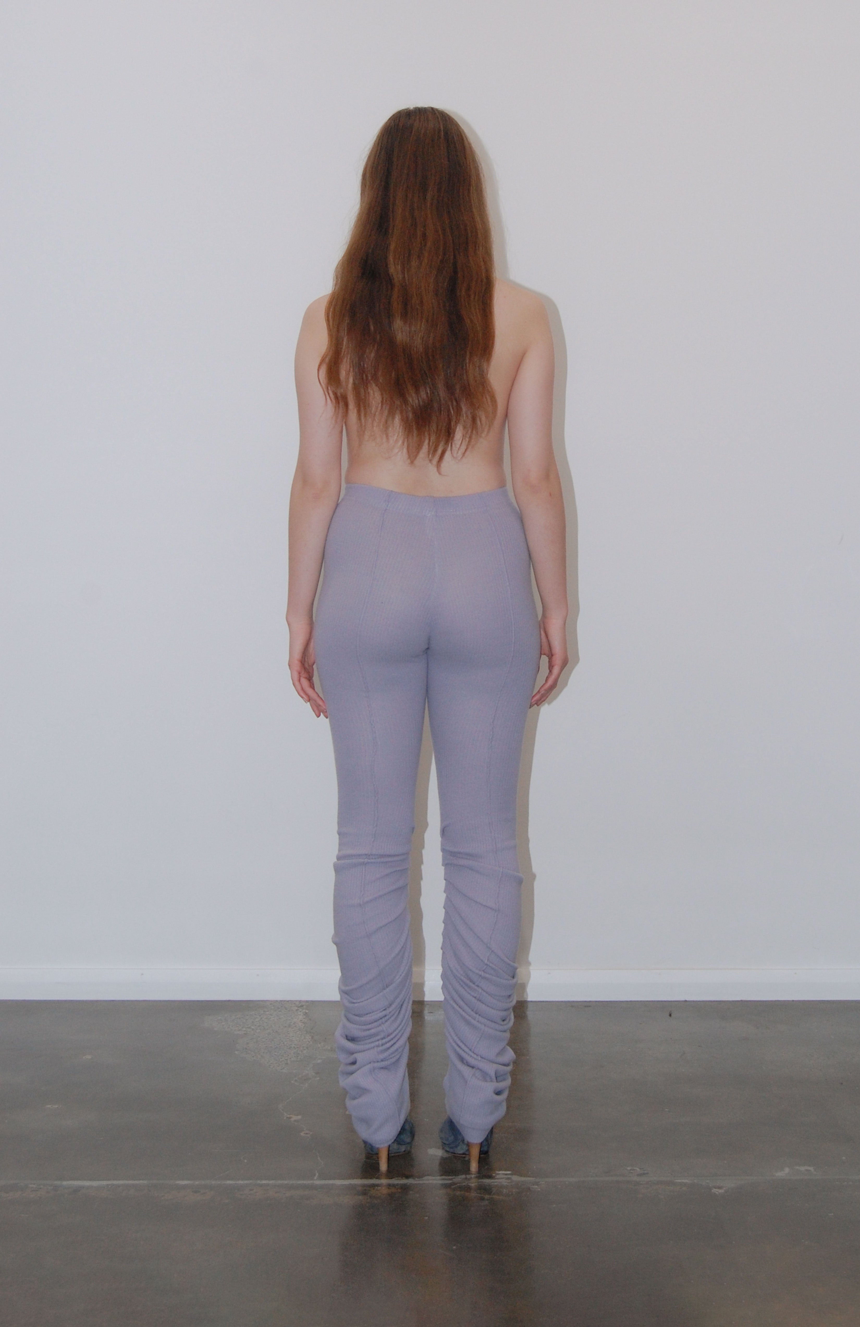 Maroske Peech High-rise wool-blend warm-up lilac leggings. Pleated inseam starts from the knee for a lamb leg effect. Flattering pin tucks run along the back and front of both legs giving you visual cues to correct your lines in the mirror.