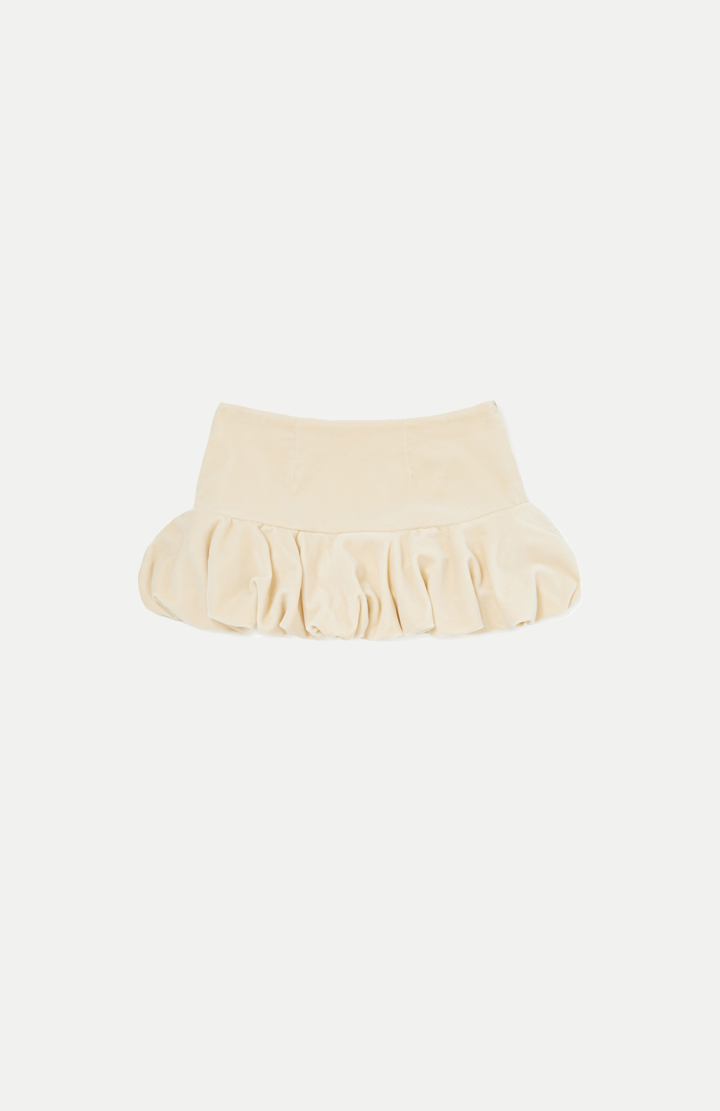 Maroske Peech A flirty playful bubble mid waisted mini skirt that salutes the fashion trends of the 1980s. This mid rise puffball style is created with a crinoline inner foundation to hold its balloon-like shape. A wonderful way to add volume to a silhouette.