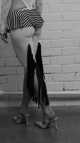 High rise natural wool tights with inserted double layered hand cut black wet look fringing from back leg seam. Fringing designed to finish at upper thigh to flatter. Perfect for showgirls
