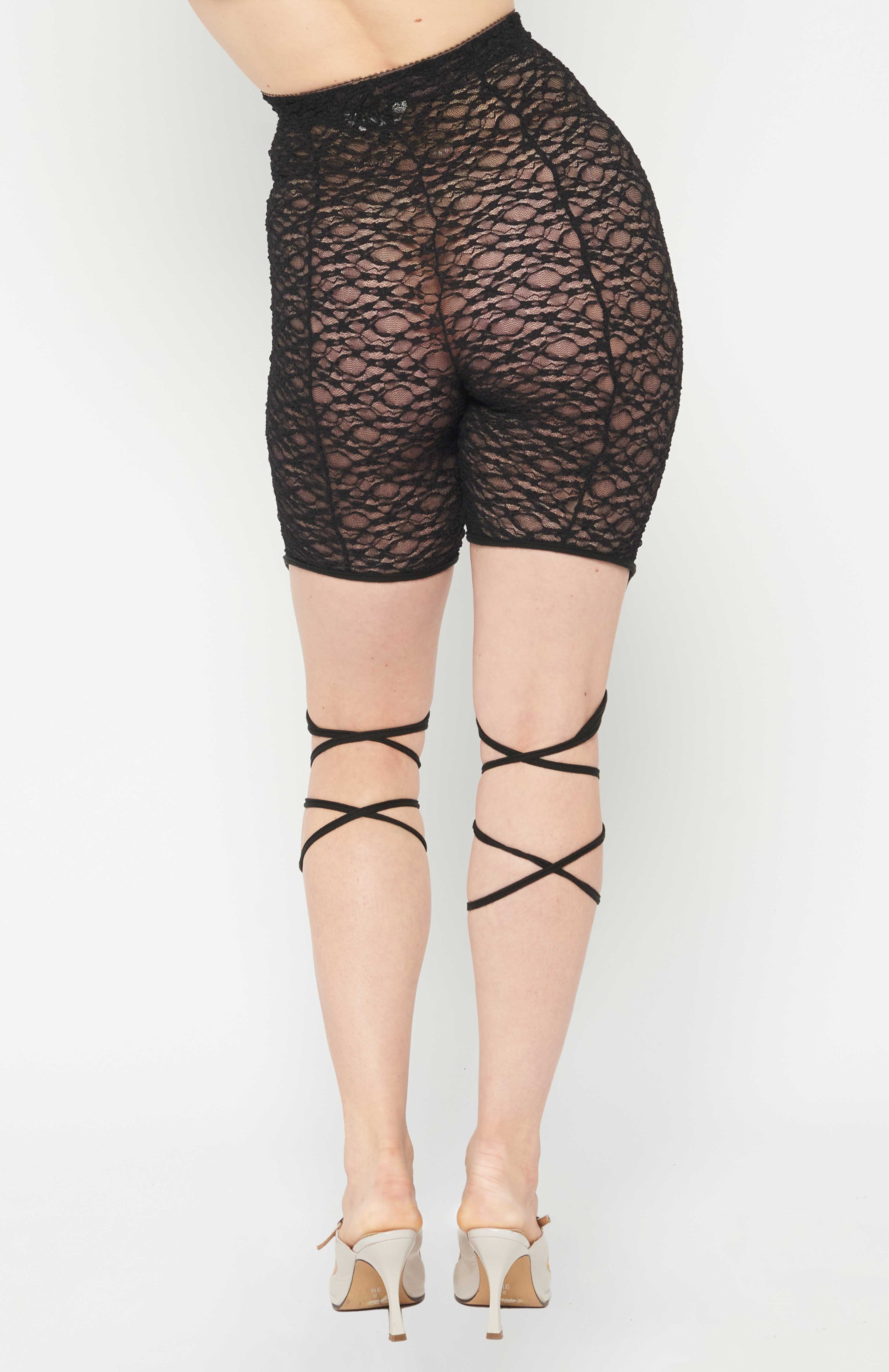 Maroske Peech High waisted black lace leggings with tendrils that grow from the knee. A spell is cast when these tendrils are wrapped around your legs and tied. Super comfortable and stretchy with a brushed elastic waistband.
