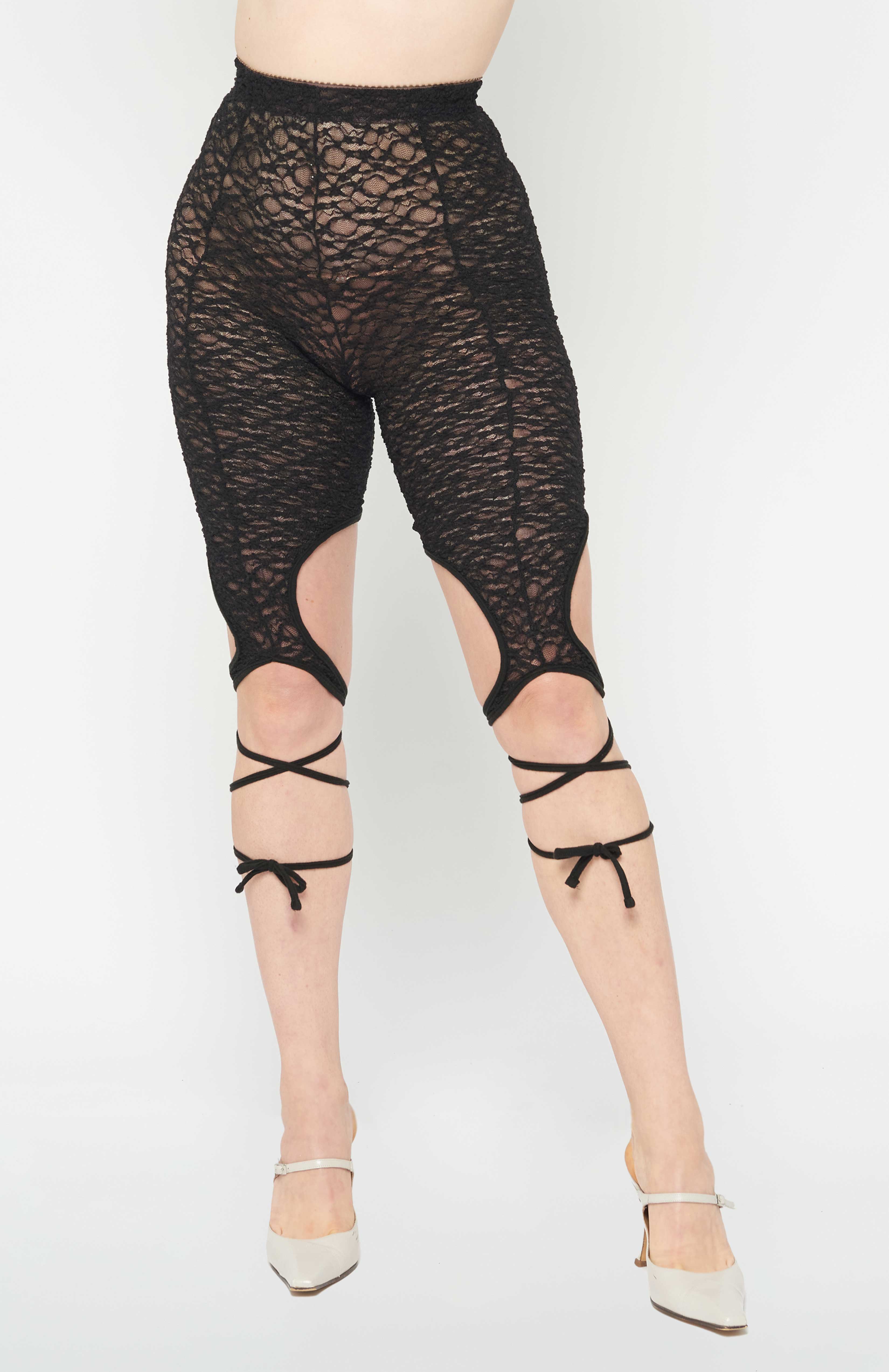 Maroske Peech High waisted black lace leggings with tendrils that grow from the knee. A spell is cast when these tendrils are wrapped around your legs and tied. Super comfortable and stretchy with a brushed elastic waistband.