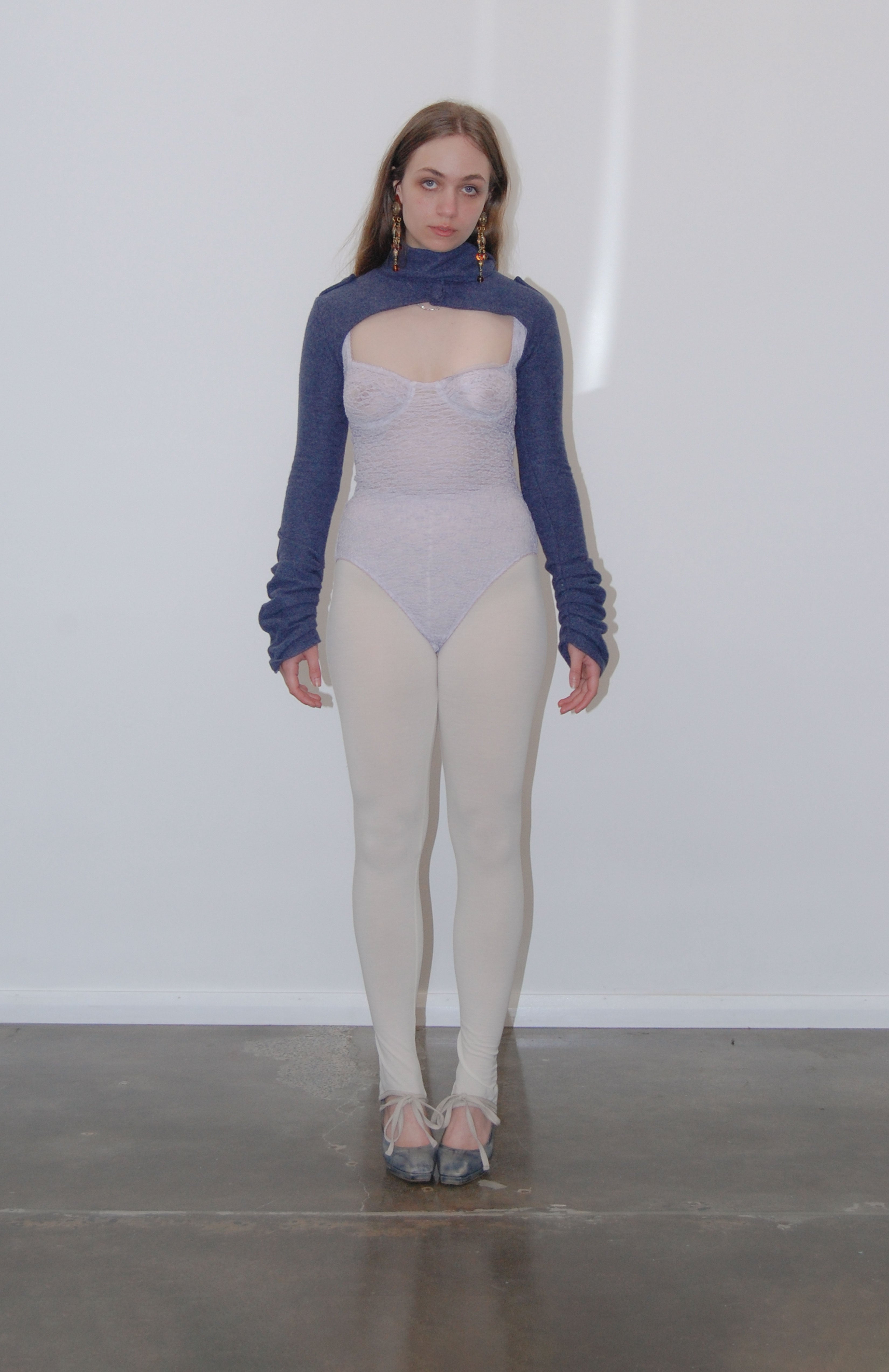 Maroske Peech A reprise of our signature stretch soft cup leotard in stunning lilac lace. Features a snap opening at gusset for ease wearer and zig-zag decorative stitching with a scalloped elastic detail.